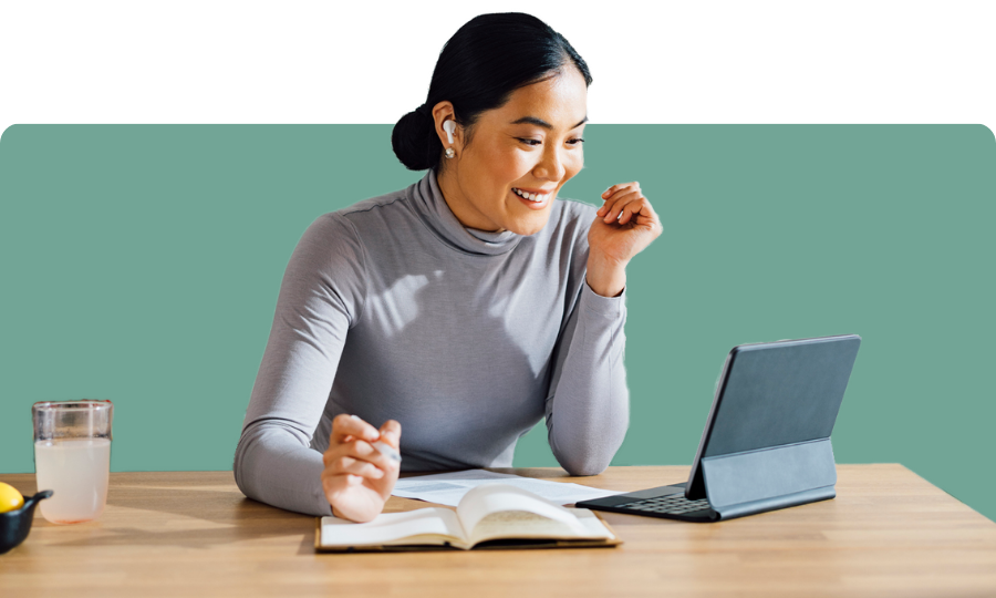 Lady looking working on Tablet